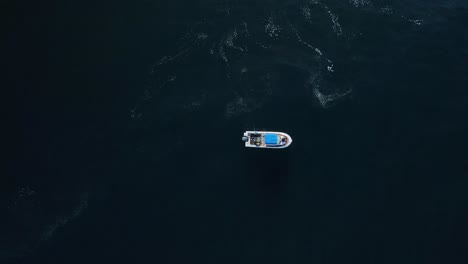 Ariel-view-of-a-small-fishing-boat-in-California