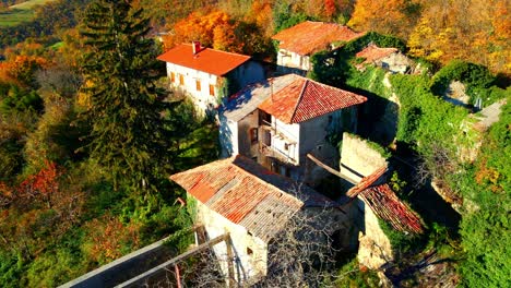 Aerial-4K-drone-video-unveils-the-haunting-beauty-of-Slapnik,-an-abandoned-village-in-Brda,-Slovenia