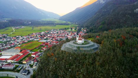 Aerial-4K-drone-footage-captures-the-majestic-Church-of-Saint-Anthony,-Kobarid--Slovenia