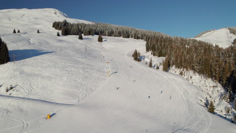 Ski-Area-In-Saalbach-Hinterglemm,-Austria-During-Winter---Aerial-Drone-Shot