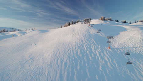 Ski-Lift-And-Ski-Area-View-In-Saalbach-Hinterglemm,-Austria---Aerial-Drone-Shot
