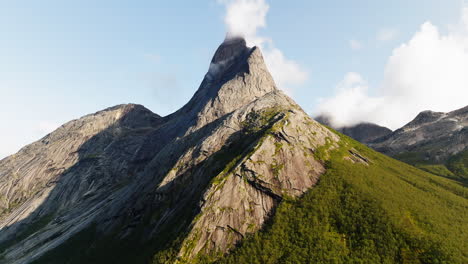 Stetind-Mountain-With-Its-Distinctive-Obelisk-shape-Against-Blue-Sky-In-Northern-Norway