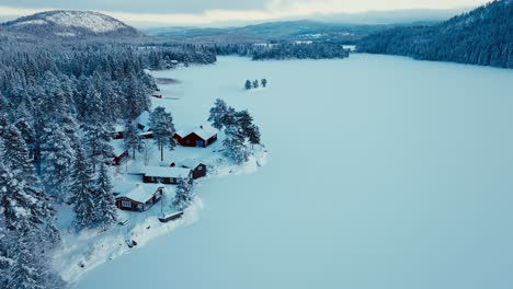 Panoramic-Frozen-Lake-Mountain-Forest-In-A-Rural-Village-In-Norway