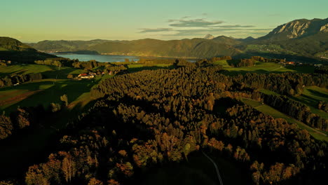 Golden-hours-sunlit-landscape-of-Attersee-captured-by-aerial-drone-at-sunset