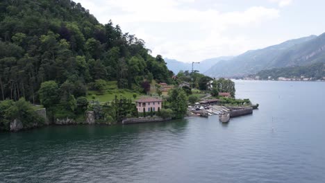 Rental-boats-docked-by-Lake-Como-a-great-tourist-experience,-aerial