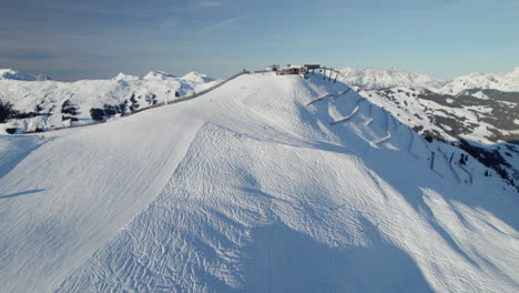 Winter-Mountain-Landscape---Ski-Resort-In-Saalbach-Hinterglemm,-Austria---Aerial-Shot