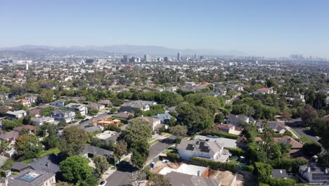 Flying-Above-Homes-in-Century-City,-Neighborhood-of-Los-Angeles-CA-USA-on-Hot-Sunny-Day