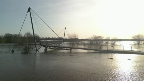 Bridge-Over-Ems-River-During-Flooding-After-Heavy-Rain-In-Meppen,-Emsland,-Germany