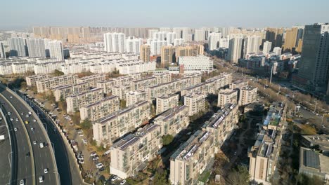An-aerial-perspective-reveals-a-residential-neighborhood-in-Linyi,-Shandong-Province,-China,-exemplifying-the-principles-of-modernity,-urbanization,-and-the-swift-expansion-of-urban-areas