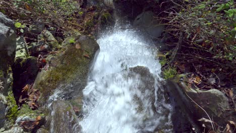 Naturally-left-small-waterfall-filmed-from-above