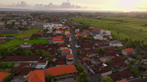 Rice-fields-and-villas-at-sunset,-Canggu,-Bali-in-Indonesia