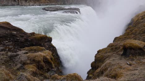 Slowmotion-shot-of-water-falling-down-over-the-Gulfoss-waterfall-in-Iceland