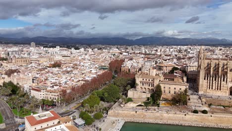 Main-square-of-medieval-european-city-Palma-de-Mallorca,-aerial-establish-shot-Spain