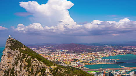 Panoramic-view-of-rock-of-Gibraltar-with-storm-clouds-in-background,-time-lapse