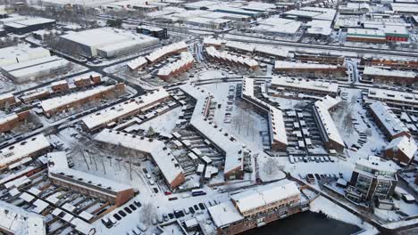 Beautiful-aerial-of-a-peaceful-small-town-covered-in-snow