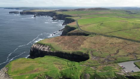 Aerial-drone-shot-of-the-countryside-fields-of-the-Kilkee-Cliffs-in-Ireland-in-County-Clare