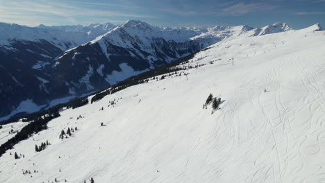 Winter-Scene-At-Ski-Resort-In-Saalbach-Hinterglemm,-Austria---Aerial-Drone-Shot