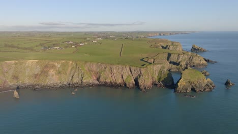 drone-panorama-of-the-Waterford-Coastline-and-farmlands-on-The-Copper-Coast-Waterford-Ireland