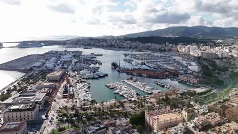 Marina-yacht-port-aerial-establish-shot-in-Mallorca-old-city-Spain