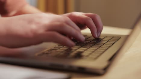 Close-Up-Of-Hands-Typing-On-Laptop-Computer