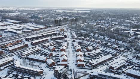 Aerial-of-a-beautiful-Dutch-town-in-winter