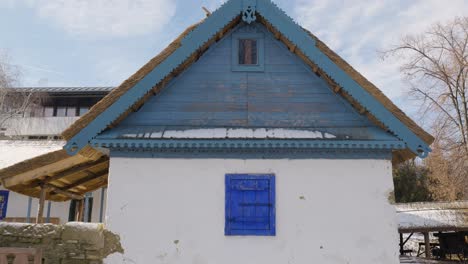 Old-House-With-Blue-Windows-And-Roof-From-19th-Century
