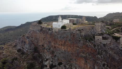 Orbital-Cinematic-View-over-Castle-of-Chora-Cliff,-Kythira-Island,-Greece