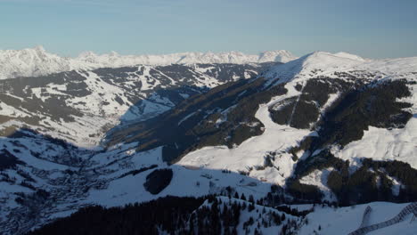 Ski-Area-And-Mountains-In-Saalbach-Hinterglemm,-Austria---Aerial-Drone-Shot