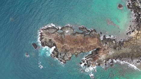 Drone-view-of-waves-hitting-rock-in-the-Fernando-de-Noronha-Archipelago
