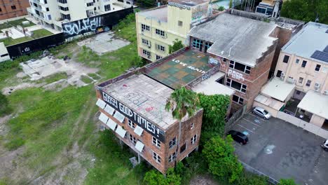Drone-aerial-of-abandoned-derelict-building-haunted-structure-urban-exploration-block-Gossy-Good-Times-Gosford-Central-Coast-Australia