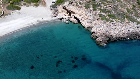 Top-View-of-Paradisiac-Rocky-Fourni-Beach-with-Crystal-Clear-Waters-in-Kythira-Island,-Greece