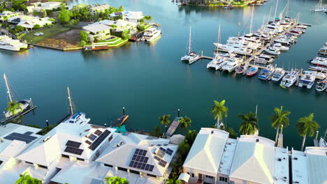 Aerial-Drone-Yachts-in-Boat-Marina-Cullen-Bay-Darwin-Australia-Surrounded-By-Luxury-Real-Estate-House-Homes-and-Greenery-During-Mid-Afternoon-Light