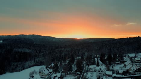 Winter-Sunset-Gloaming-Over-The-Snow-Covered-Mountain-Forest-Landscape-Of-Bavaria,-Germany