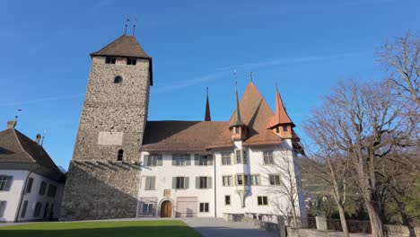 Low-angle-shot-of-historic-Spiez-Castle-in-Switzerland-on-a-sunny-day