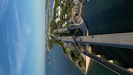 Drone-shot-of-a-car-driving-through-the-famous-7-mile-bridge-in-the-Florida-Keys
