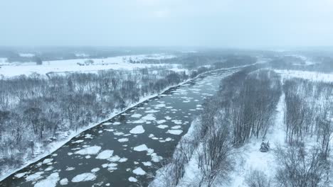 Aerial-view-of-the-ice-floating-down-the-river