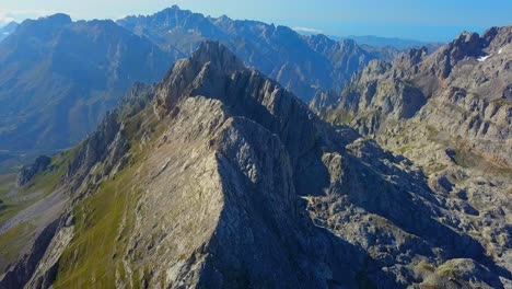Elegance:-Rugged-elegance-defines-Picos-de-Europa-as-the-drone-glides-above,-unveiling-the-sheer-beauty-of-nature's-fortress