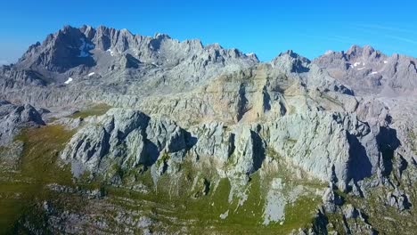 Picos-panorama:-A-drone-dance-above-Europe's-peaks,-unveiling-a-mountain-masterpiece