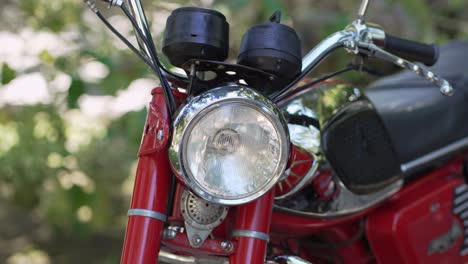Retro-Motorcycle-Headlight-and-Handlebar---Close-up