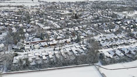 Beautiful-aerial-overview-of-a-small-rustic-town-in-winter