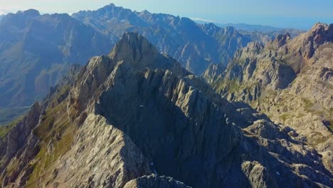Aerial-embrace-of-Picos-de-Europa:-Rugged-elegance,-a-dance-between-earth-and-sky