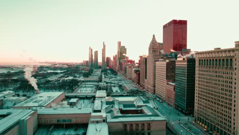 Aerial-of-the-Chicago-skyline-on-a-chilly-winter-day,-showcases-the-city's-iconic-architecture-amidst-the-frosty-atmosphere