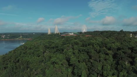 Drone-approaching-the-Triple-Frontier-between-Argentina,-Paraguay,-and-Brazil