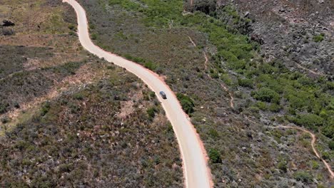 4x4-pickup-truck-driving-on-dirt-roads-on-mountain-passes-in-the-Cederberg-with-some-scenic-views-and-landscape