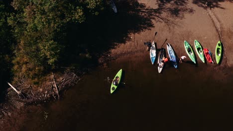 Aerial-view-of-kayakers-on-beach