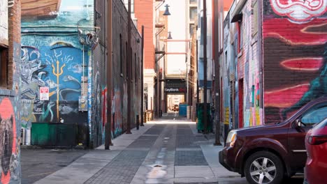 View-of-popular-graffiti-art-lane-of-Freak-Alley-with-nobody-in-sight,-downtown-city-of-Boise,-Idaho,-USA