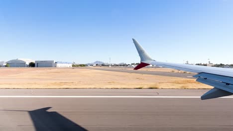 window-seat-view-of-airplane-taking-off-at-runway-at-hermosillo-airport