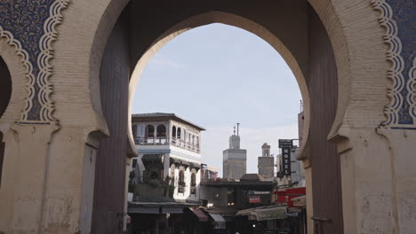 tourist-entering-the-blue-door-gate-of-the-old-town-welcoming-new-visitors-in-the-famous-center-of-the-city