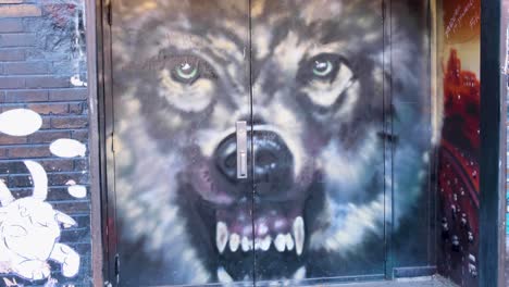 Graffiti-art-of-Gmork-wolf-from-The-NeverEnding-Story-in-Freak-Alley,-downtown-Boise-City-in-Idaho,-USA