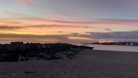 Los-Cristianos-in-Tenerife,-sunset-golden-hour-over-sea,-Canary-Islands-Spain